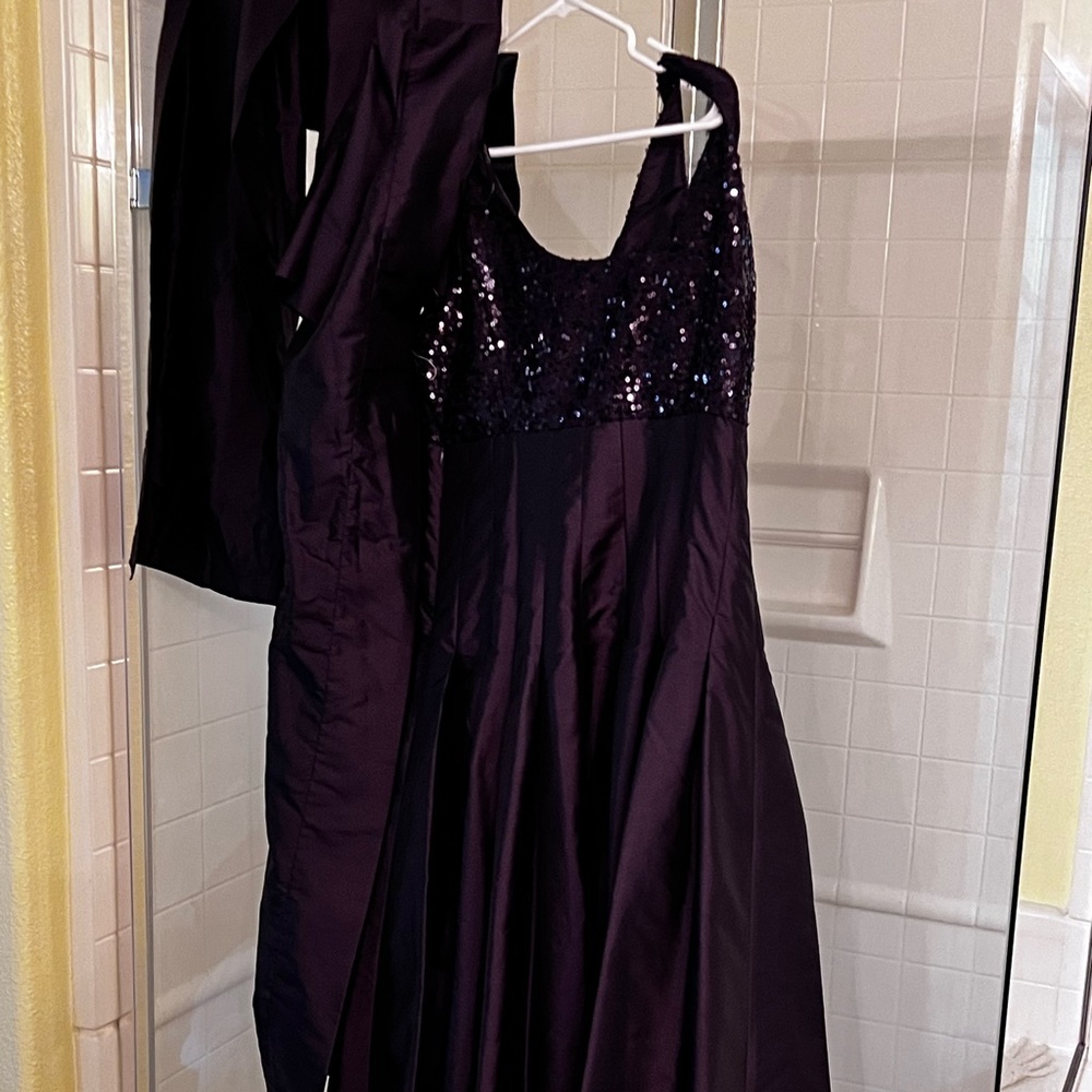 A Calvin Klein Event Dress. That’s never been wore